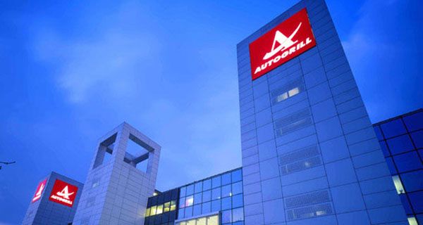 Sede Autogrill a Milano. Architettura moderna con logo Autogrill ben visibile.